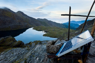 Solar Panel with Bhairabkunda lake in Northern Central Nepal.